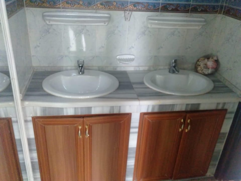Shared Dormitory | Bathroom sink