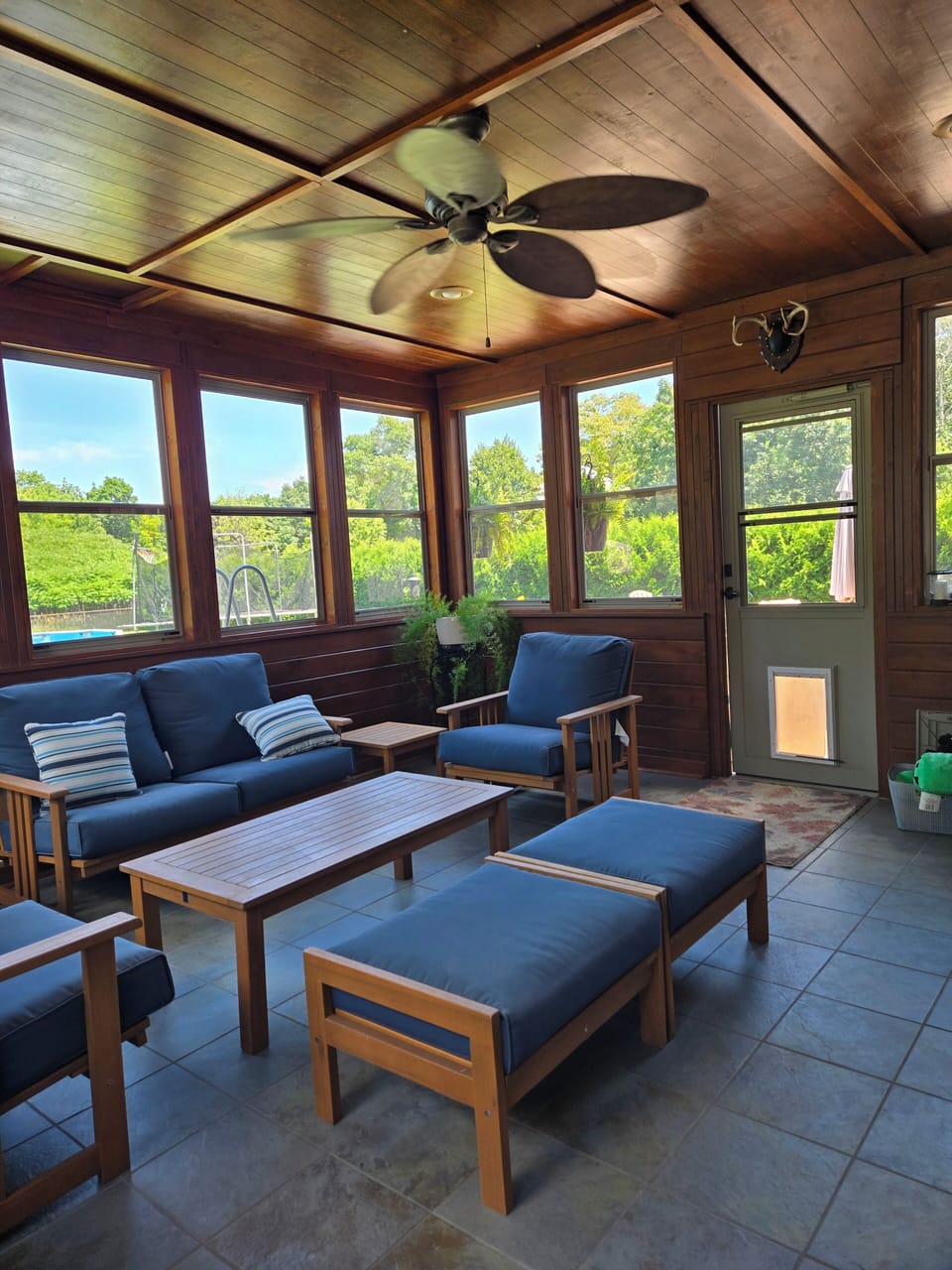 Three seasons room. Right of the kitchen leading to the patio. 