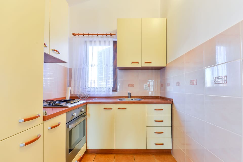 Apartment, 2 Bedrooms A1 | Private kitchen | Fridge, oven, stovetop, coffee/tea maker