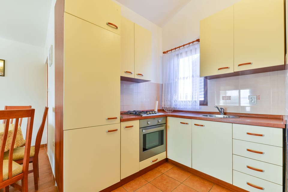 Apartment, 2 Bedrooms A1 | Private kitchen | Fridge, oven, stovetop, coffee/tea maker