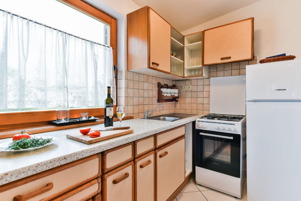 Apartment, 3 Bedrooms A1 | Private kitchen | Full-size fridge, oven, stovetop, electric kettle