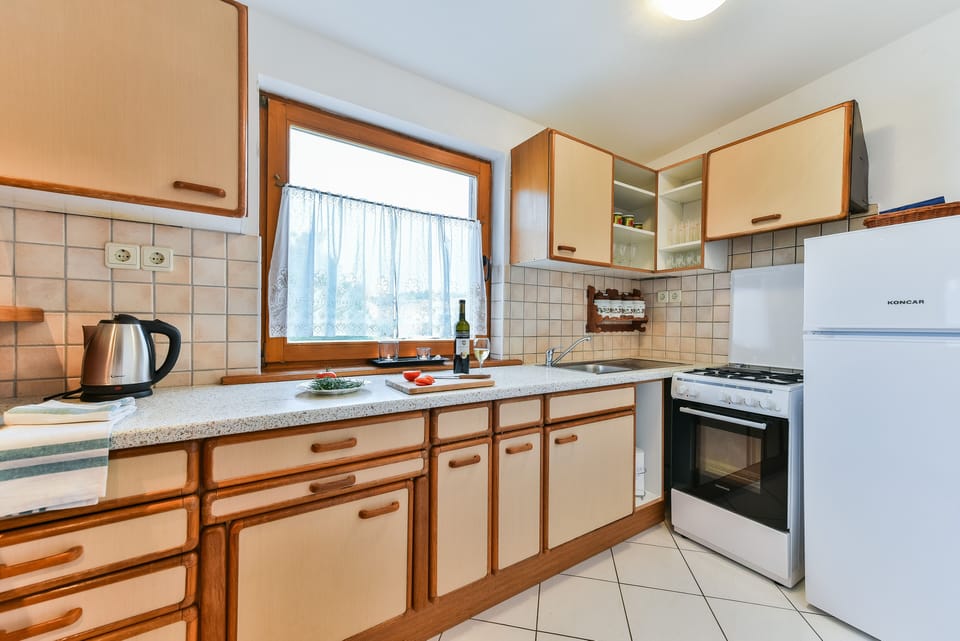 Apartment, 3 Bedrooms A1 | Private kitchen | Full-size fridge, oven, stovetop, electric kettle