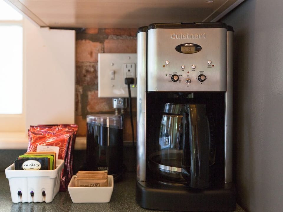 Coffee, tea, sugar, and cream are provided to get you started.