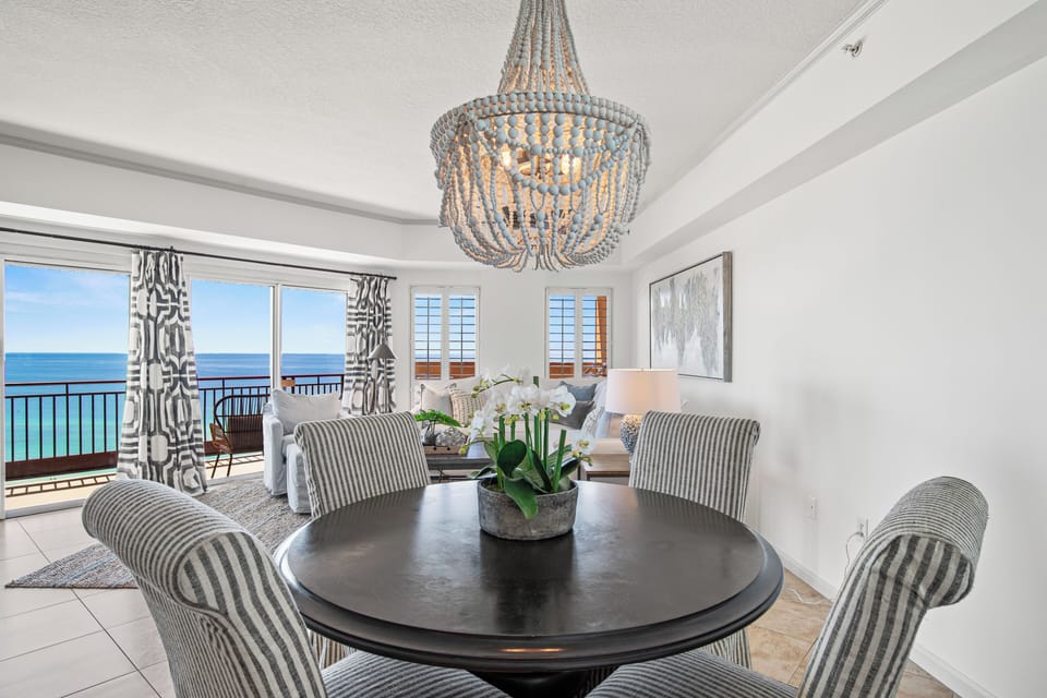 The dining table seats four and offers beautiful Gulf views while you enjoy your meals.