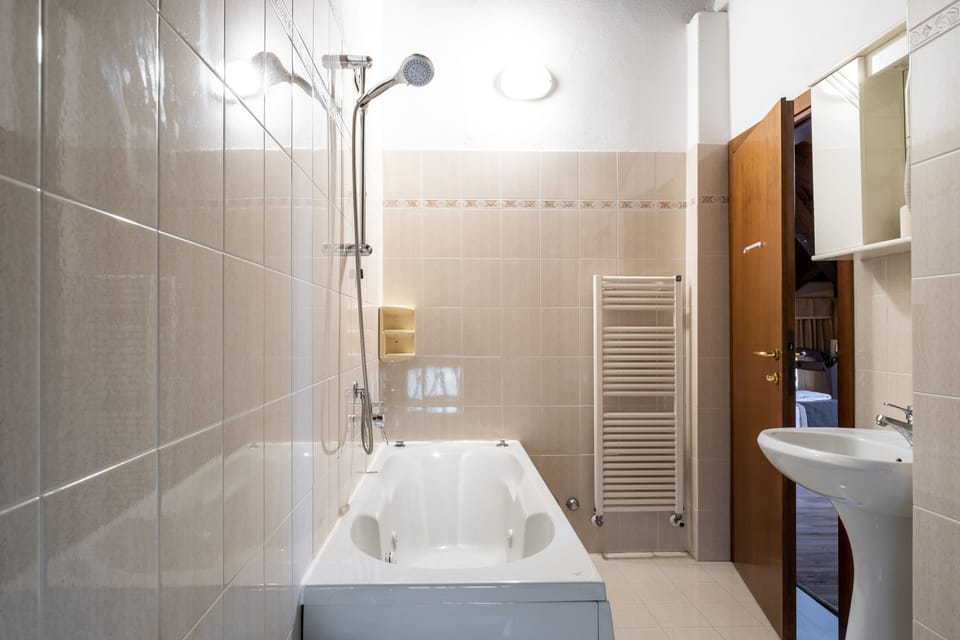 Family Room | Bathroom | Free toiletries, hair dryer, slippers, towels