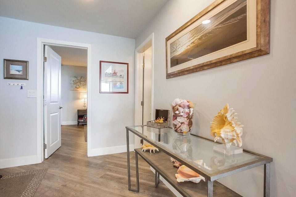 Foyer with entrance to bedroom and bathroom to the right