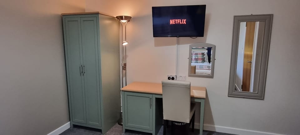 Individually decorated, individually furnished, desk, laptop workspace