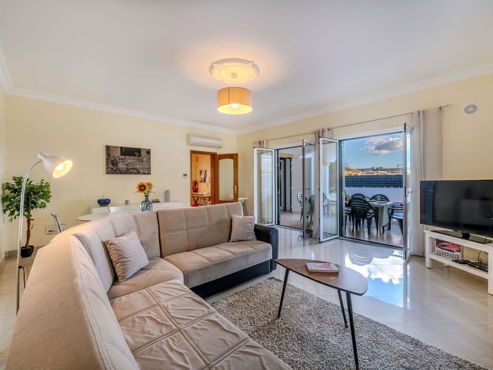 Furniture, Interior Design, Flooring, Couch, Floor, Ceiling, Room, Table, Apartment, Living Room