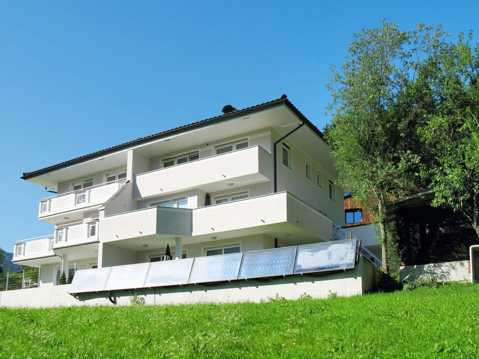 Sky, Plant, Building, Window, Tree, Land Lot, Shade, Wood, Urban Design, Facade