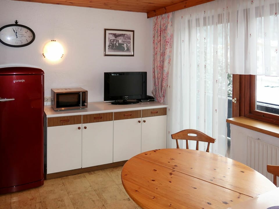 Cabinetry, Property, Furniture, Wood, Table, Lighting, Television, Drawer, Interior Design, Home Appliance