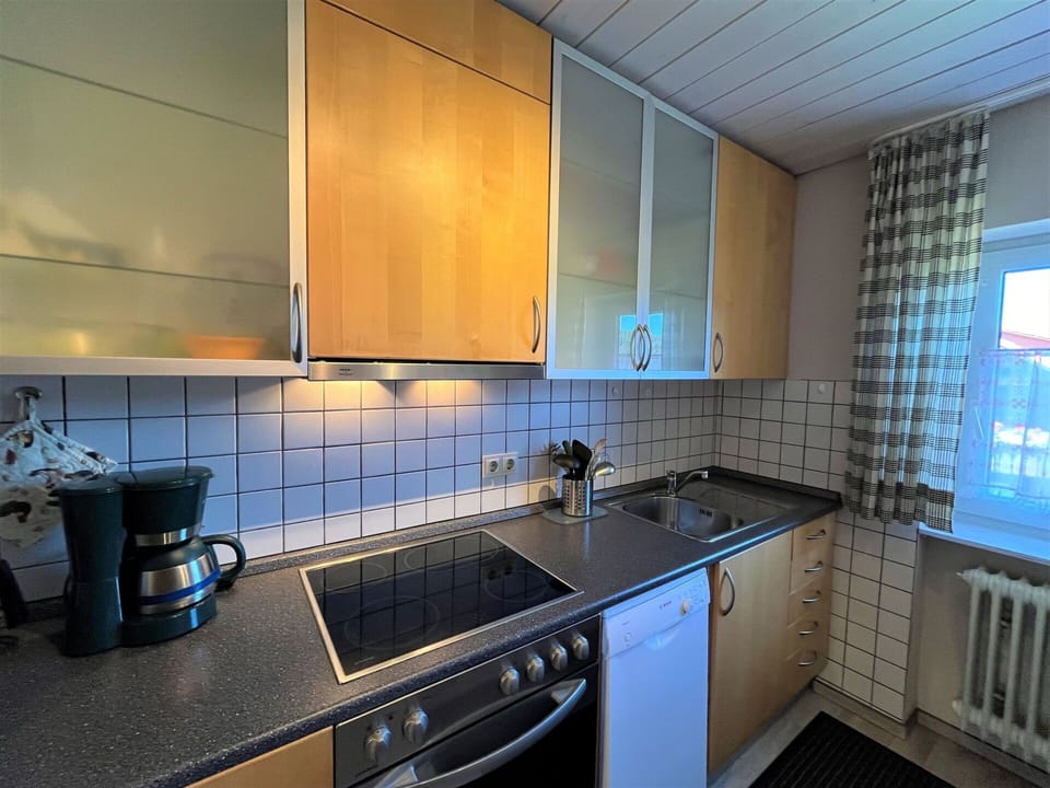 Cabinetry, Property, Countertop, Kitchen Sink, Sink, Tap, Building, Kitchen Stove, Kitchen, Interior Design