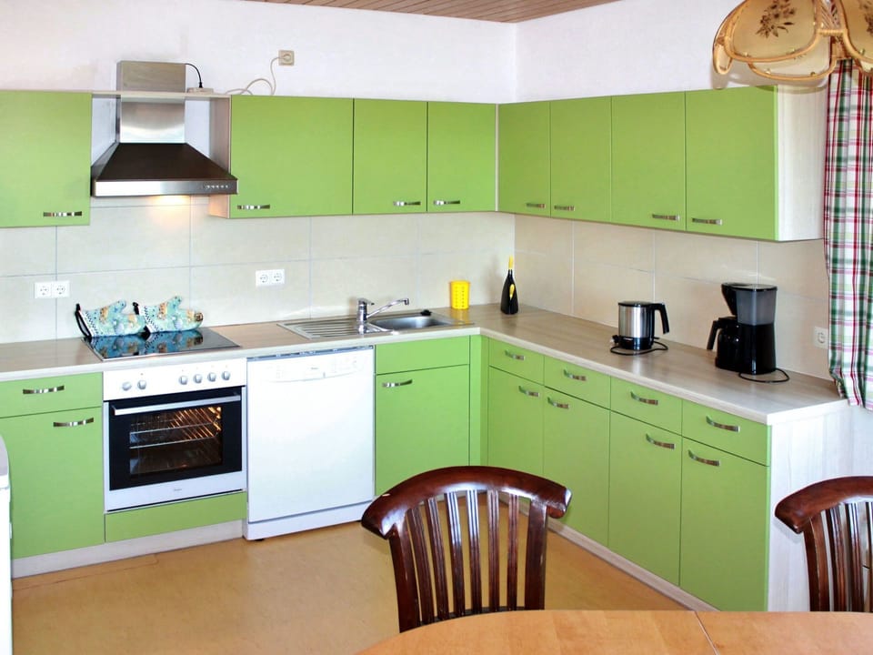 Countertop, Room, Kitchen, Cabinetry, Furniture, Green, Property, Kitchen Stove, Interior Design, Building