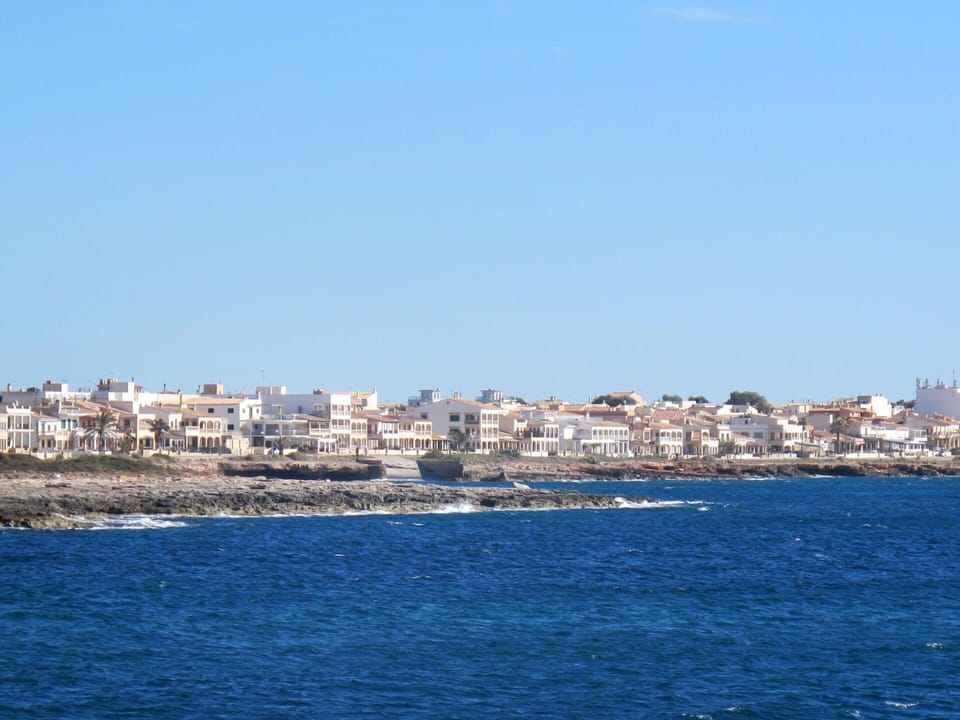 Water, Sky, Daytime, Azure, Building, Coastal And Oceanic Landforms, Body Of Water, Landscape, Beach, Natural Landscape