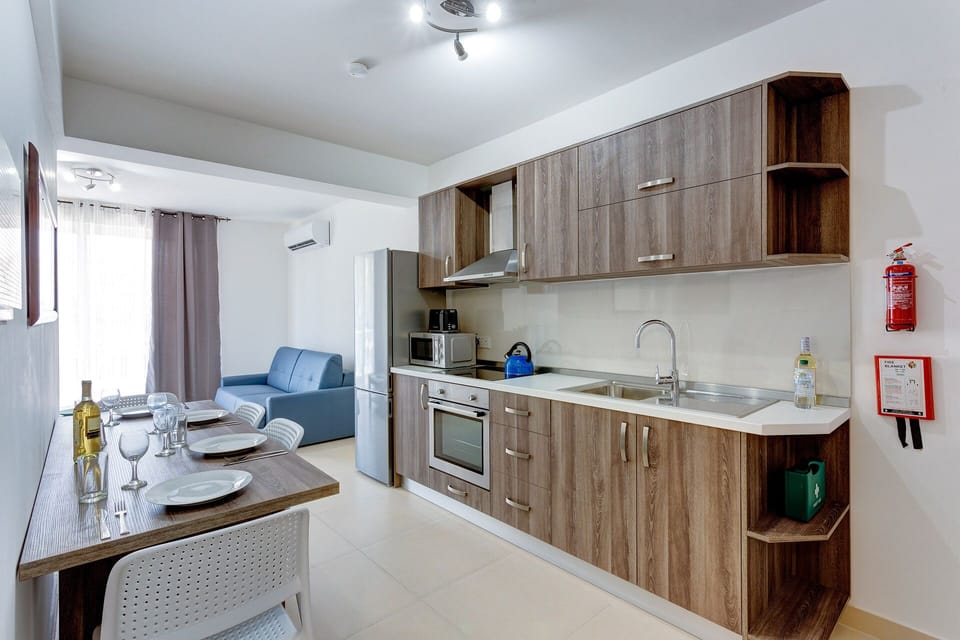 Apartment (1 Bedroom) | Private kitchen | Full-size fridge, microwave, oven, dishwasher