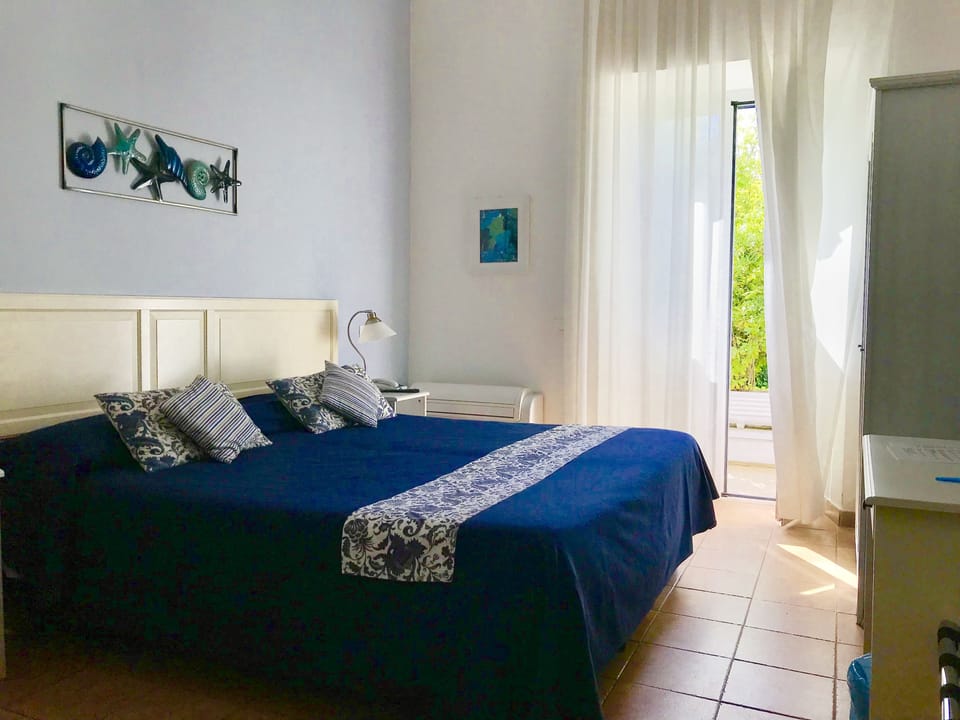 Double Room, Patio | In-room safe, individually furnished, free WiFi, bed sheets