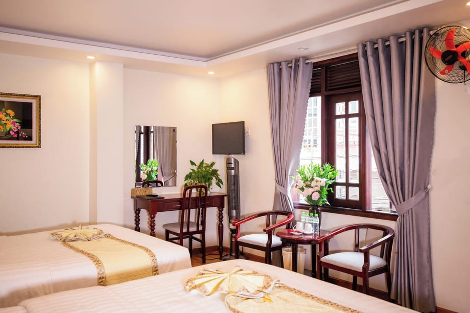 Family Double Room, City View | Hypo-allergenic bedding, minibar, desk, laptop workspace