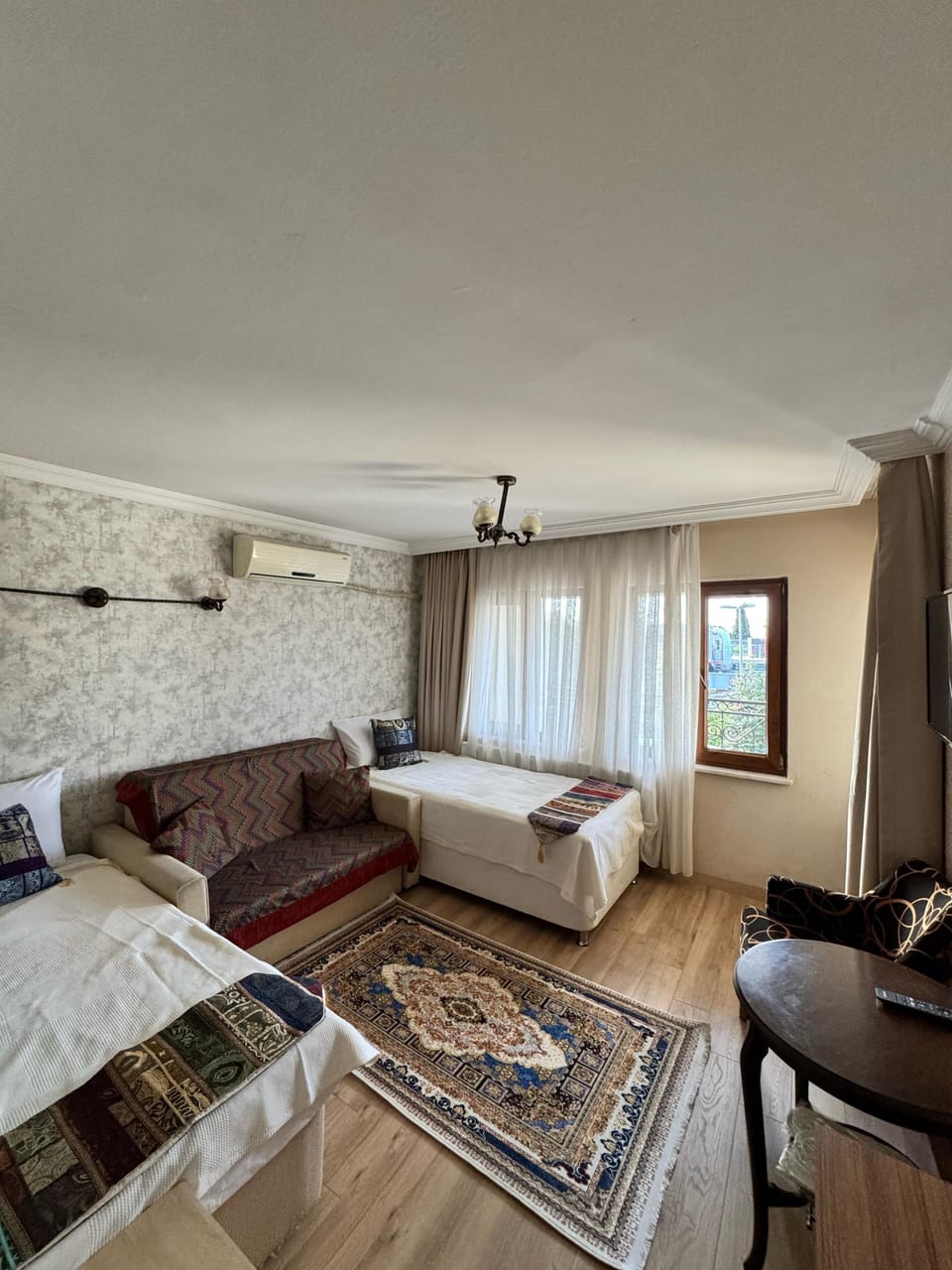 Quadruple Room with Sea View | Minibar, in-room safe, desk, blackout drapes