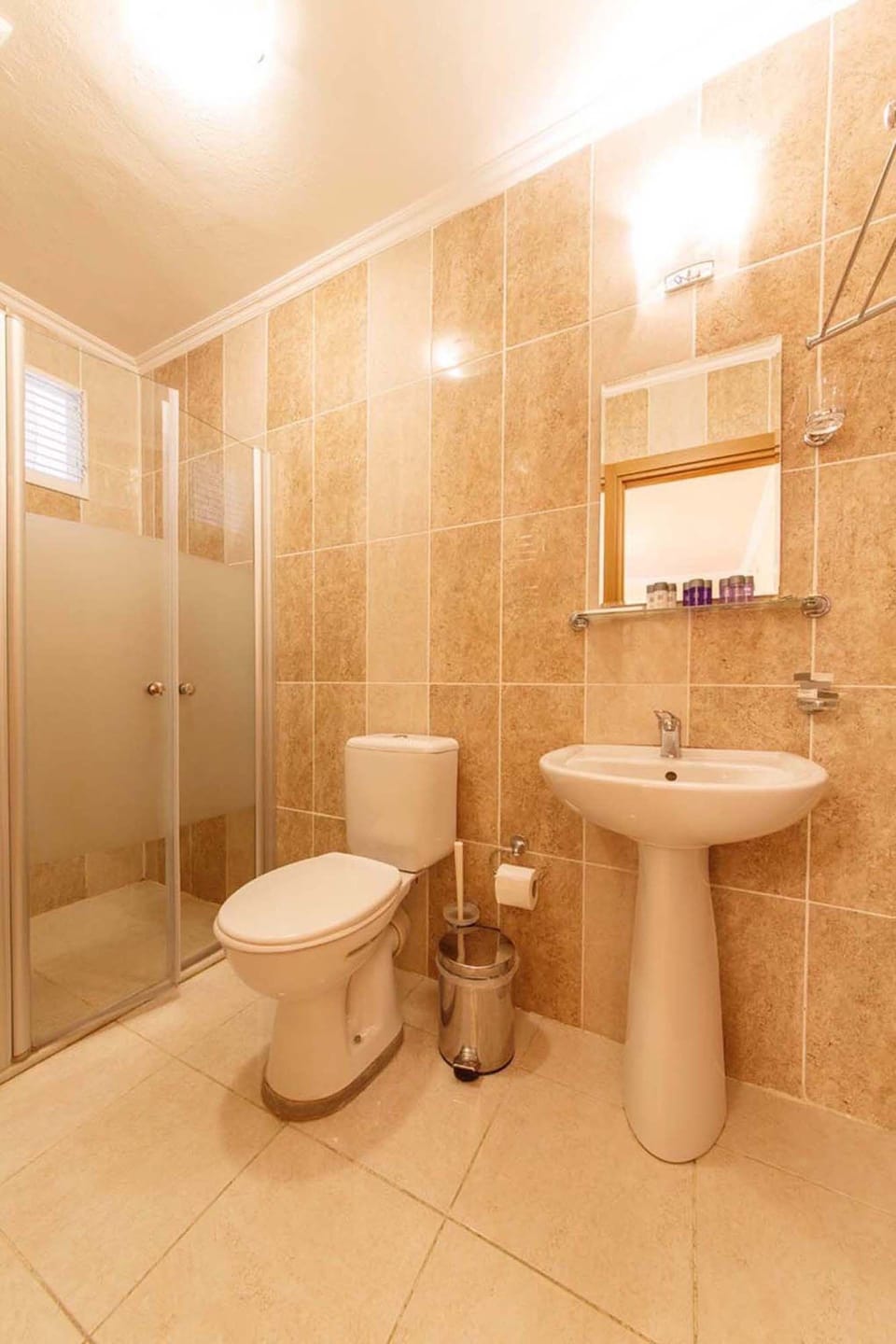 Shower, free toiletries, hair dryer, slippers