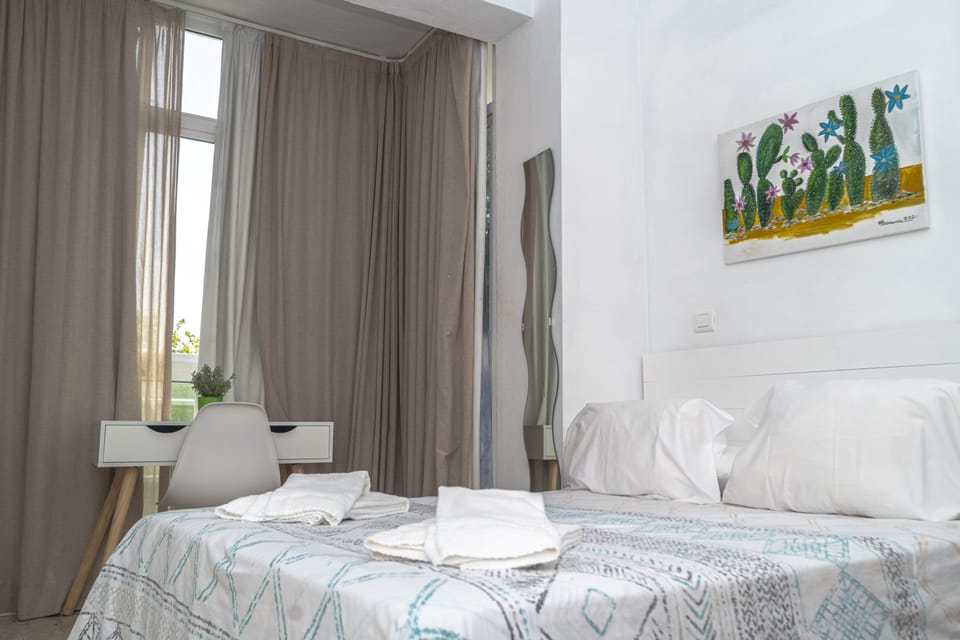 Double Room | 1 bedroom, down comforters, blackout drapes, iron/ironing board