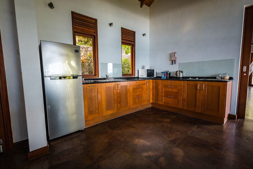 Villa, 2 Bedrooms, Non Smoking, Ocean View | Private kitchen | Coffee/tea maker, fridge, microwave, stovetop