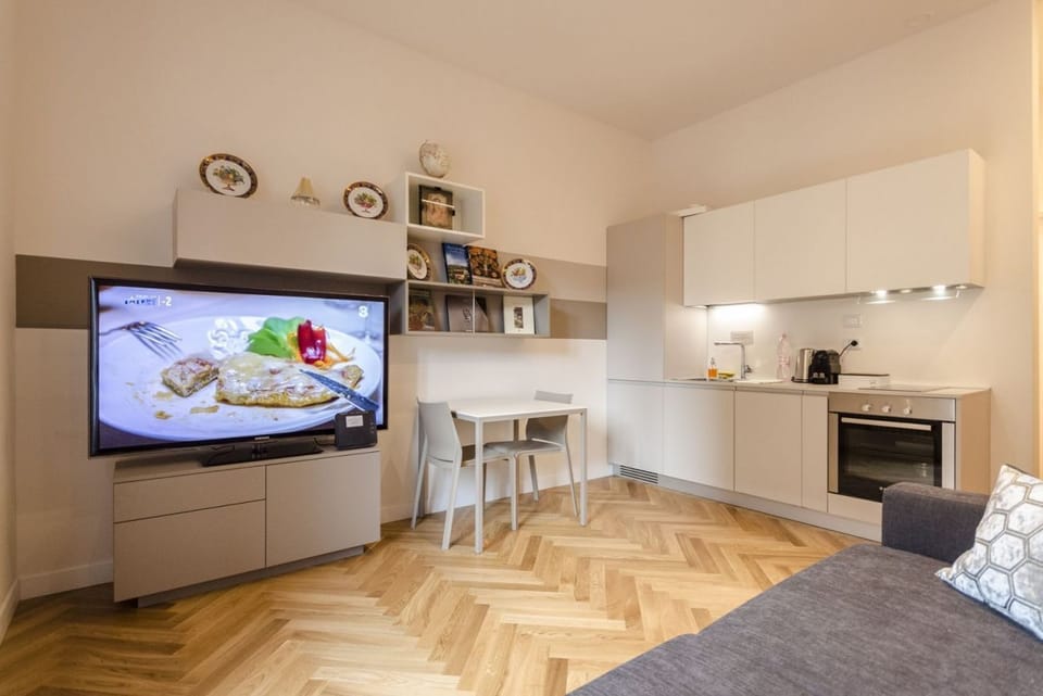 Apartment, 1 Bedroom | Living area | Flat-screen TV