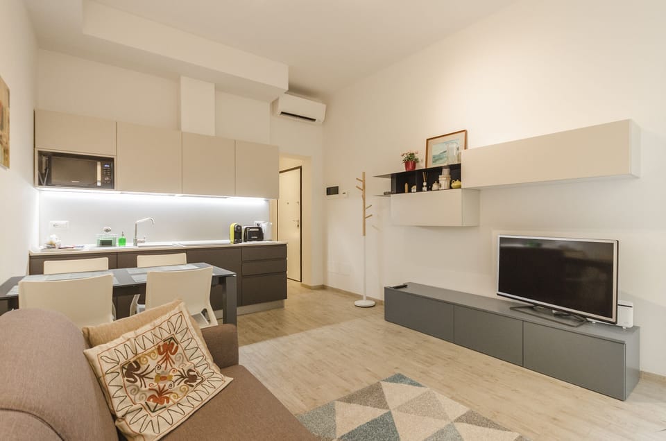 Apartment, 1 Bedroom | Living area | Flat-screen TV