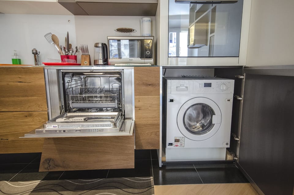 Apartment, 1 Bedroom | Private kitchen | Full-size fridge, microwave, stovetop, dishwasher