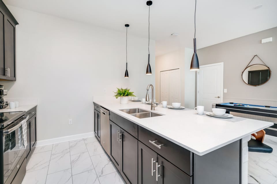 Contemporary Cuisine: Unleash your culinary creativity in our open-concept kitchen, complete with modern furnishings that elevate your cooking experience