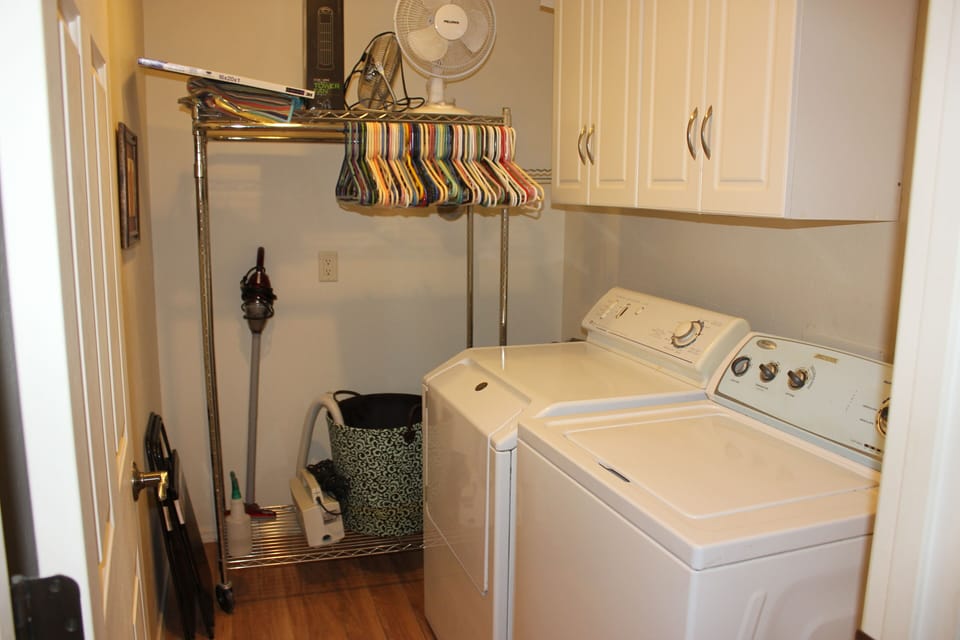 Laundry room with full size washer and dryer