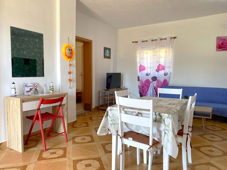 Family House, 2 Bedrooms, Sea View | Living area | TV