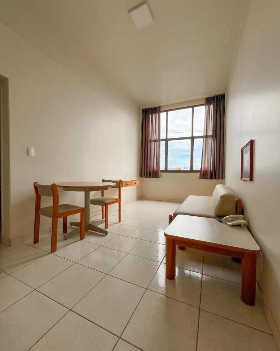 Minibar, desk, bed sheets