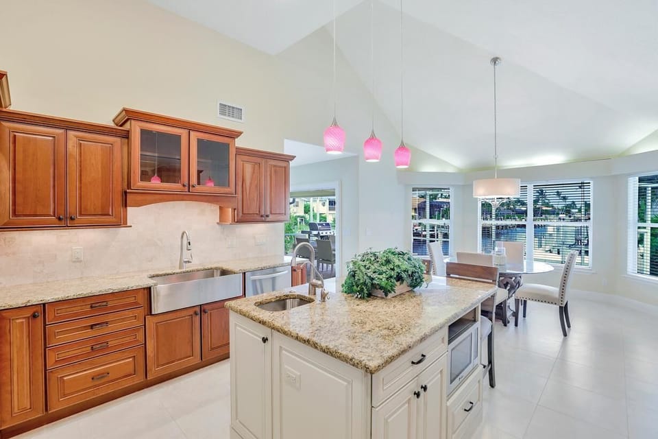 House, Multiple Beds (Waterfront home with pool and foosbal) | Private kitchen | Fridge, microwave, oven, stovetop