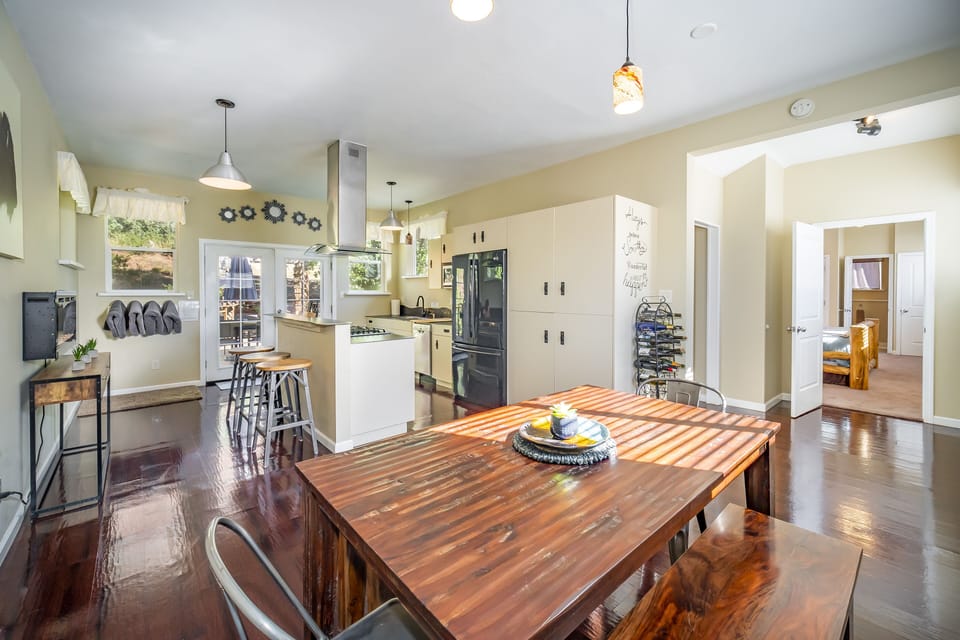 This spacious kitchen is well equipped cooking and gathering. 
