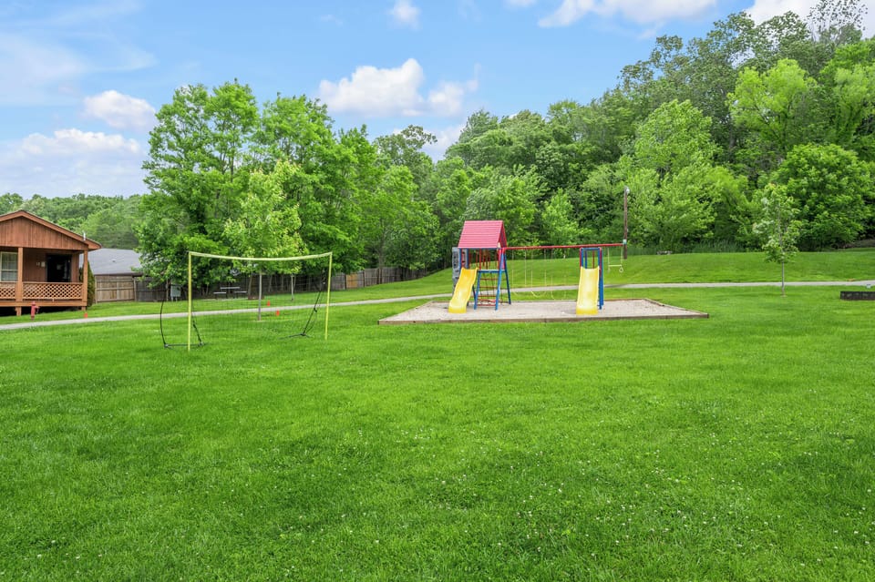 Playground/Picnic Area located at sister property at Cave Run Lodge 1 min away.