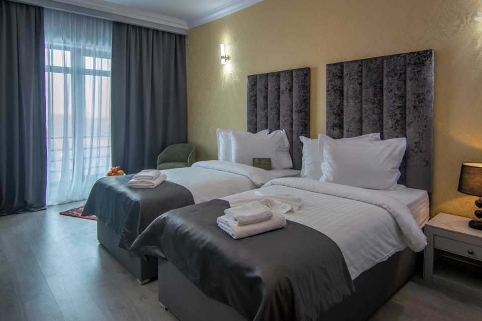 Premium Twin Room, 2 Twin Beds | Minibar, in-room safe, free WiFi, bed sheets