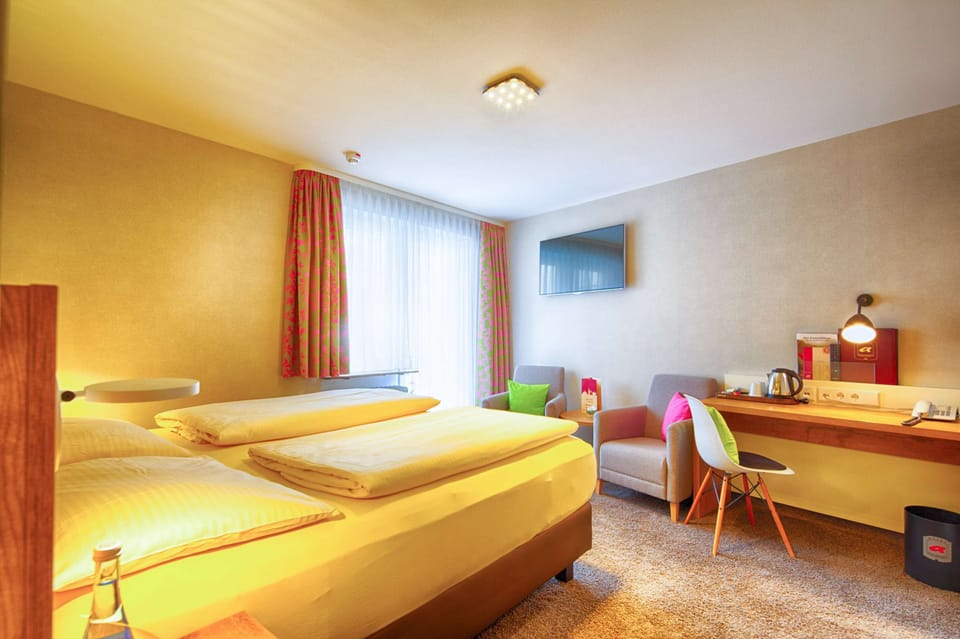 Premium bedding, in-room safe, individually decorated, desk