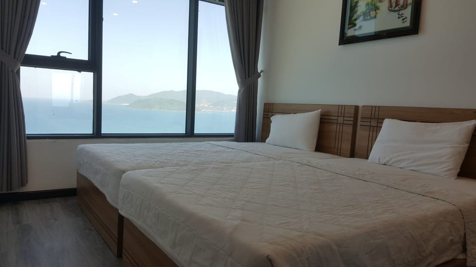 Sea View Apartment 3 Beds | 1 bedroom, desk, blackout drapes, iron/ironing board
