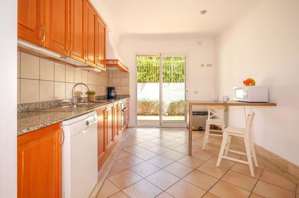 Cabinetry, Countertop, Furniture, Wood, Kitchen, Kitchen Appliance, Kitchen Stove, Interior Design, Orange, Home Appliance