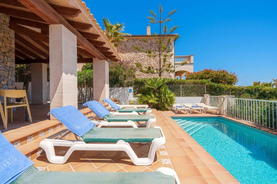 Water, Furniture, Sky, Property, Plant, Building, Azure, Outdoor Furniture, Swimming Pool, Shade