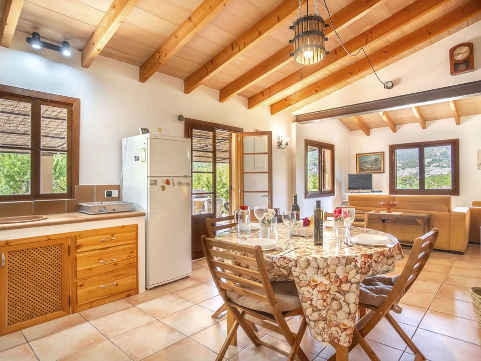 Furniture, Cabinetry, Property, Countertop, Table, Chair, Wood, Lighting, Interior Design, Window