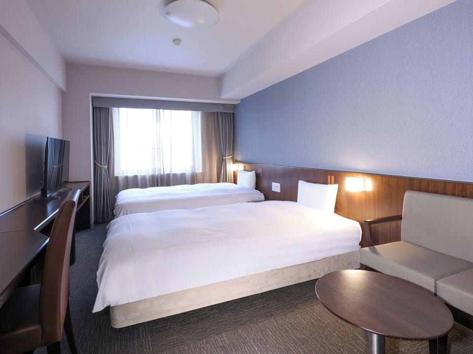 Premium bedding, down comforters, blackout drapes, free WiFi