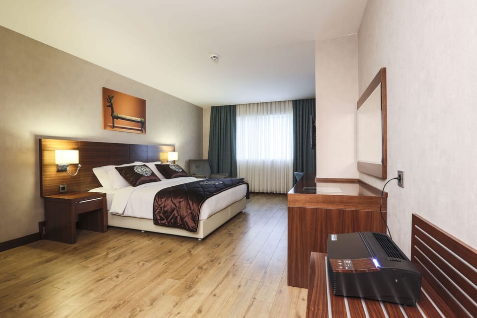 Double Room, City View | Premium bedding, down comforters, memory foam beds, in-room safe