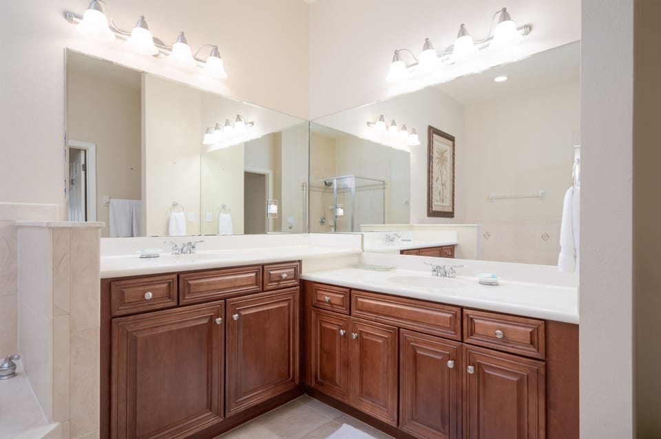 Master Bathroom features shower, separate soaking tub and double vanities.