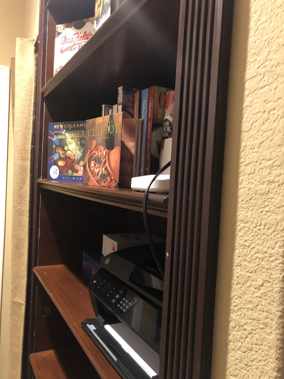 Cookbook/Internet/Wifi/Printer Cabinet located in bedroom 4