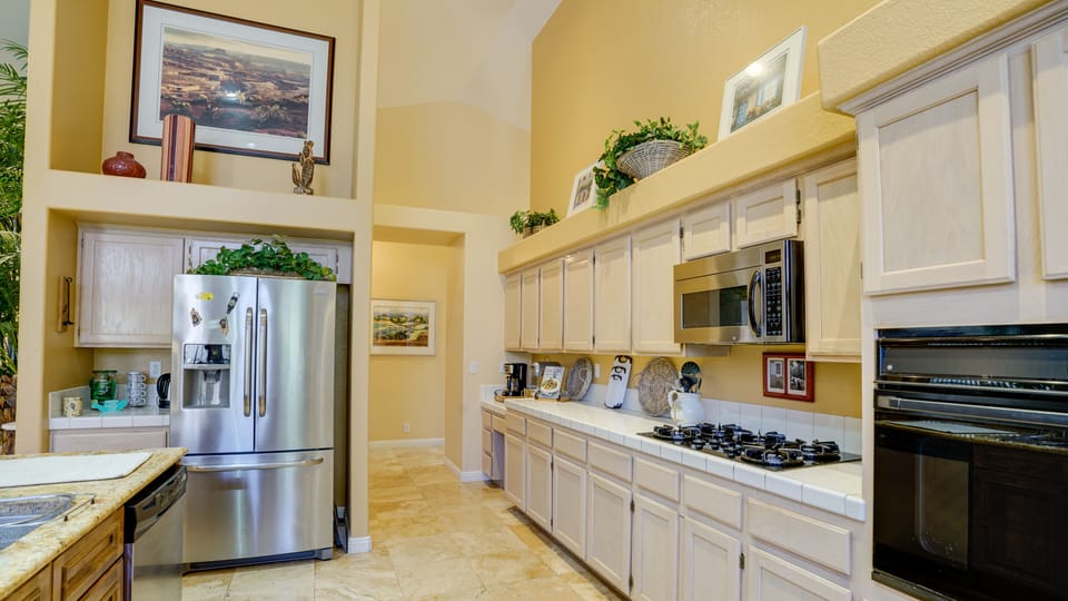 Open galley style kitchen with 20' high ceiling