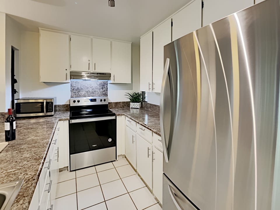 Stainless steel appliances throughout.