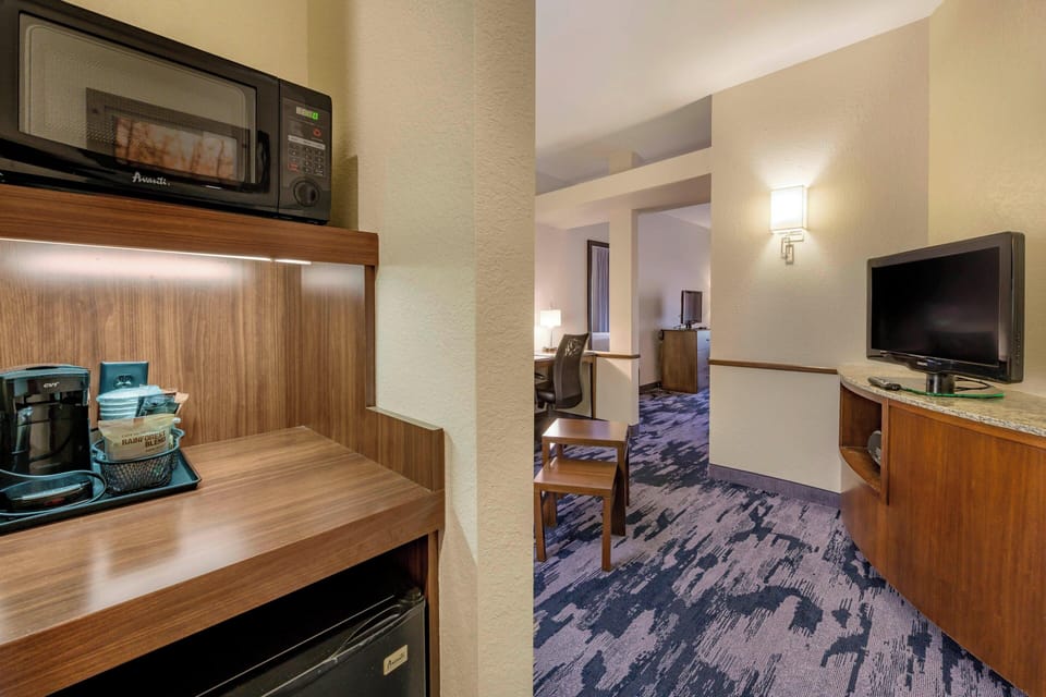 Suite, 1 Bedroom | In-room safe, desk, blackout drapes, iron/ironing board
