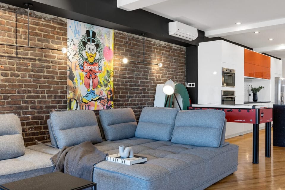 Living Room #1: Features 8 luxurious, brand-new full sofa beds, perfect for lounge group seating and providing ample sleeping space. Includes a Smart HD TV with Netflix, YouTube, and Prime Video.