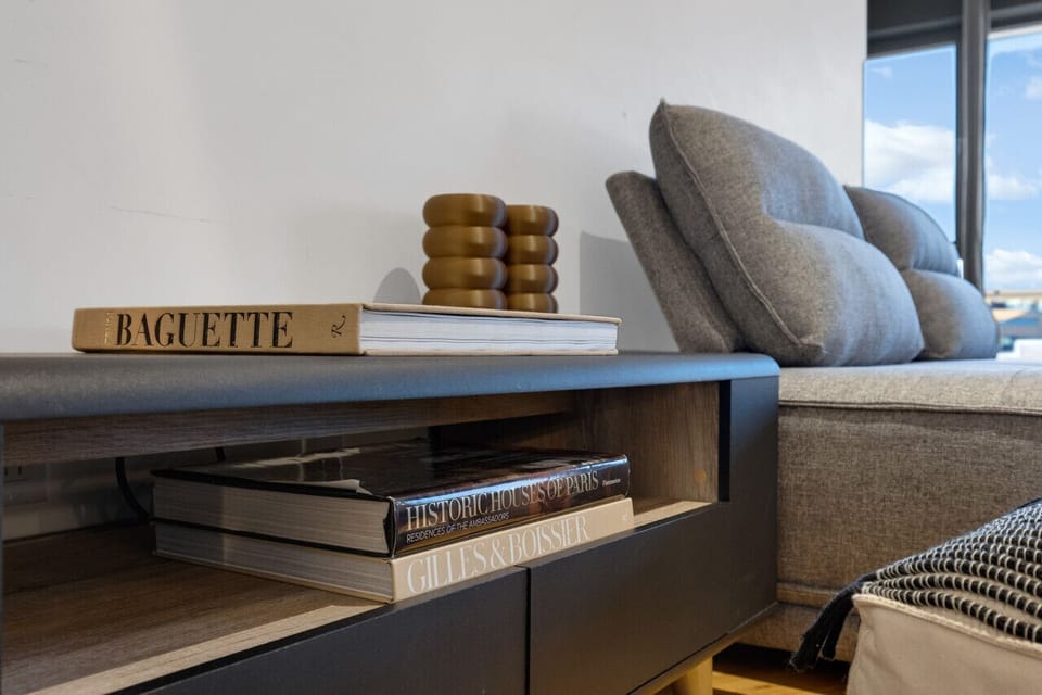 Living Room #1: Features 8 luxurious, brand-new full sofa beds, perfect for lounge group seating and providing ample sleeping space. Includes a Smart HD TV with Netflix, YouTube, and Prime Video.