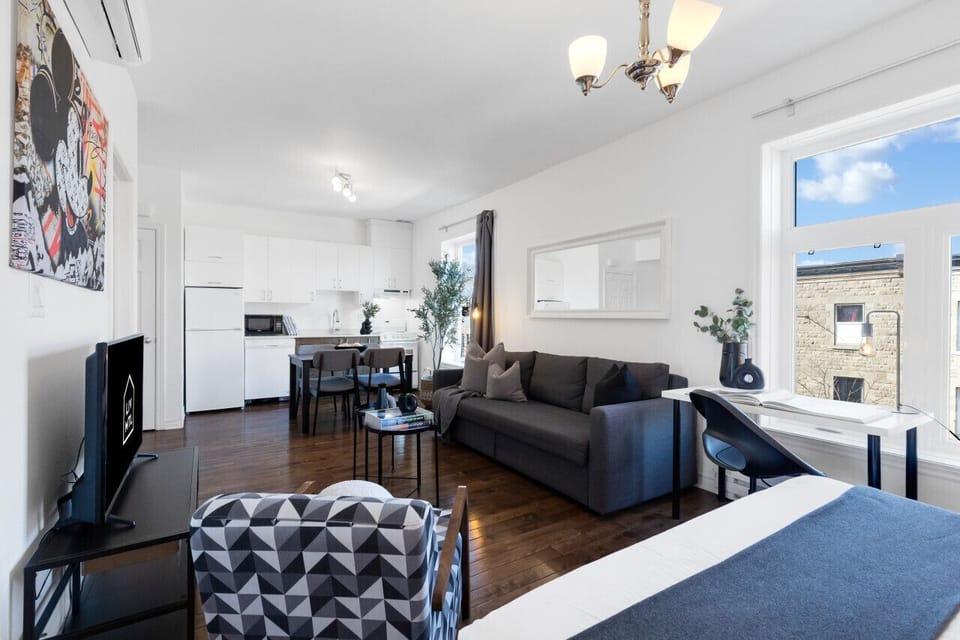 Living Room: Features 1 sofa bed, 1 queen-size bed with memory foam, Smart HD TV with Netflix, YouTube, and Prime.